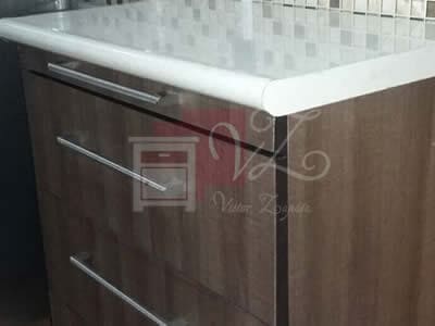 Reparación de mueble de melamina y cubierta.