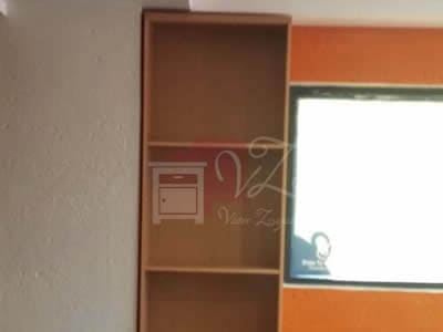 Reparación de entrepaños de librero de melamina.
		        		