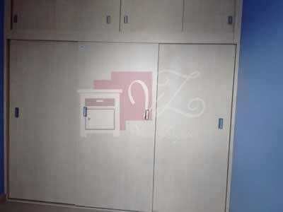 Closet de melamina color maple.