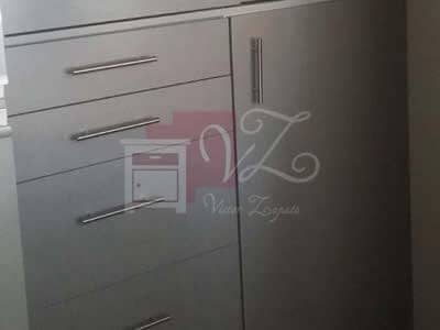 Closet de melamina tipo aluminio.