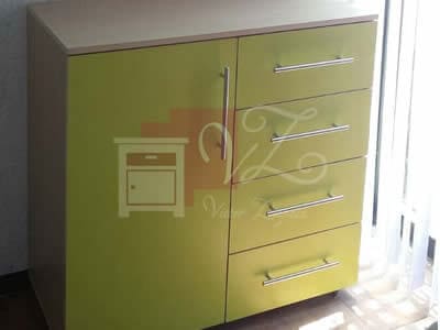 Librero infantil con espacio para trabajo de melamina color verde limón.